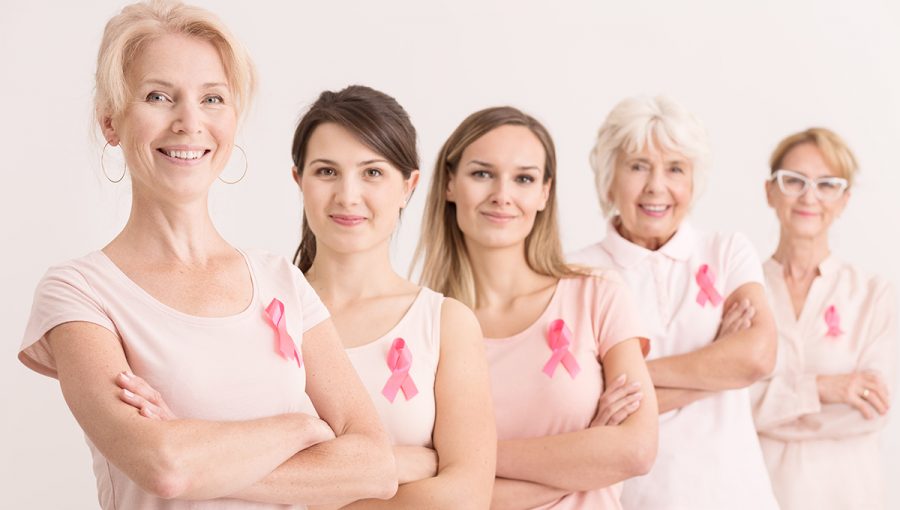 Ženy nosiace ružové stužky na znak svetového dňa rakoviny prsníka. Zdroj: iStockphoto.com