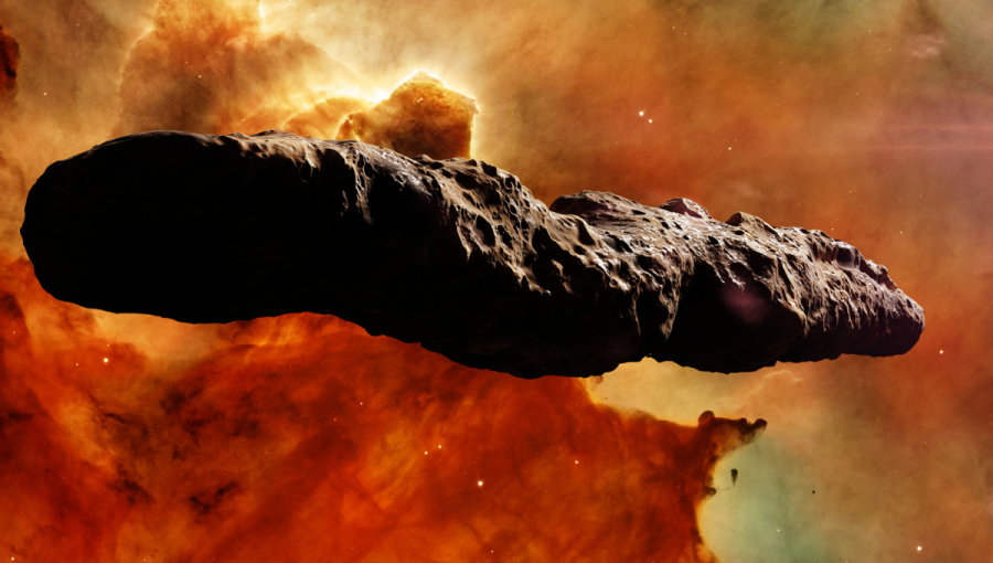 Umelecká predstava asteroidu Oumuamua na žlto-červenom pozadí vesmíru. Zdroj: iStockphoto