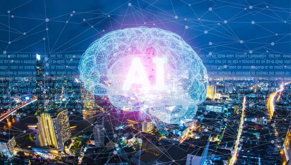 Obrázok ilustruje koncept AI (umelej inteligencie) ako obrovského ľudského mozgu vznášajúceho sa nad mestom. Zdroj: iStockphoto.com