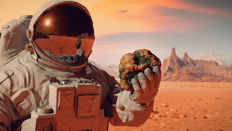 Astronaut objavuje živé organizmy v hornine na Marse. Zdroj: iStockphoto.com