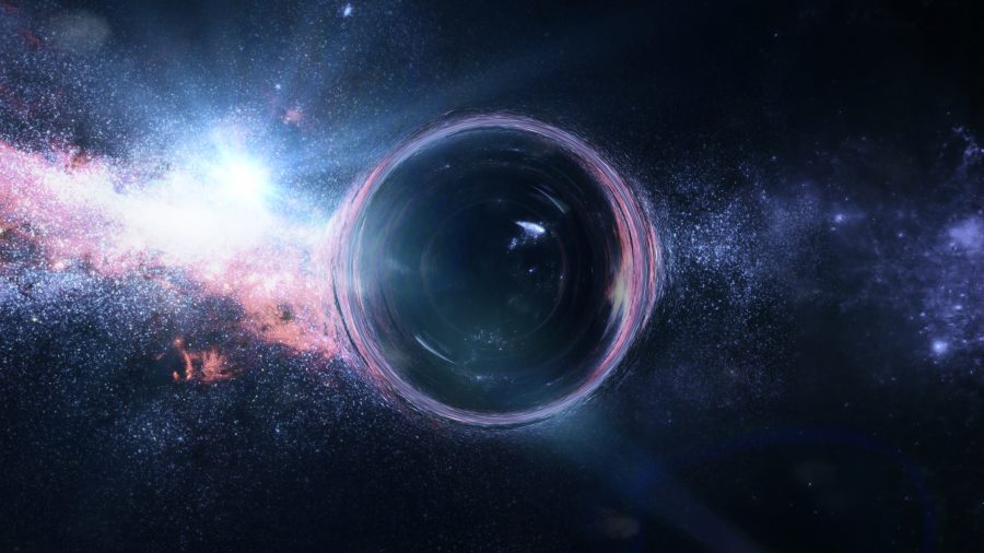 Čierna diera s efektom gravitačnej šošovky pred jasnými hviezdami. Zdroj: iStockphoto.com