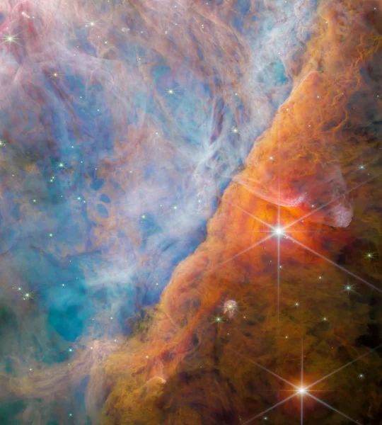 Bližší pohľad do Veľkej hmloviny Orion. Zdroj: Webb/ESA, NASA, CSA, M. Zamani/Webb/ESA, PDRs4ALL ERS Team