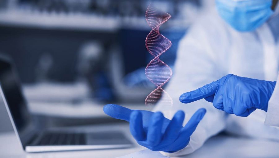 Holografický obraz DNA v rukách vedca. Zdroj: iStock.com/Jacob Wackerhausen