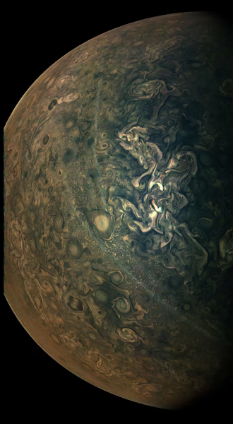 Pohľad na búrlivé severné oblasti Jupitera. Zdroj: NASA/JPL