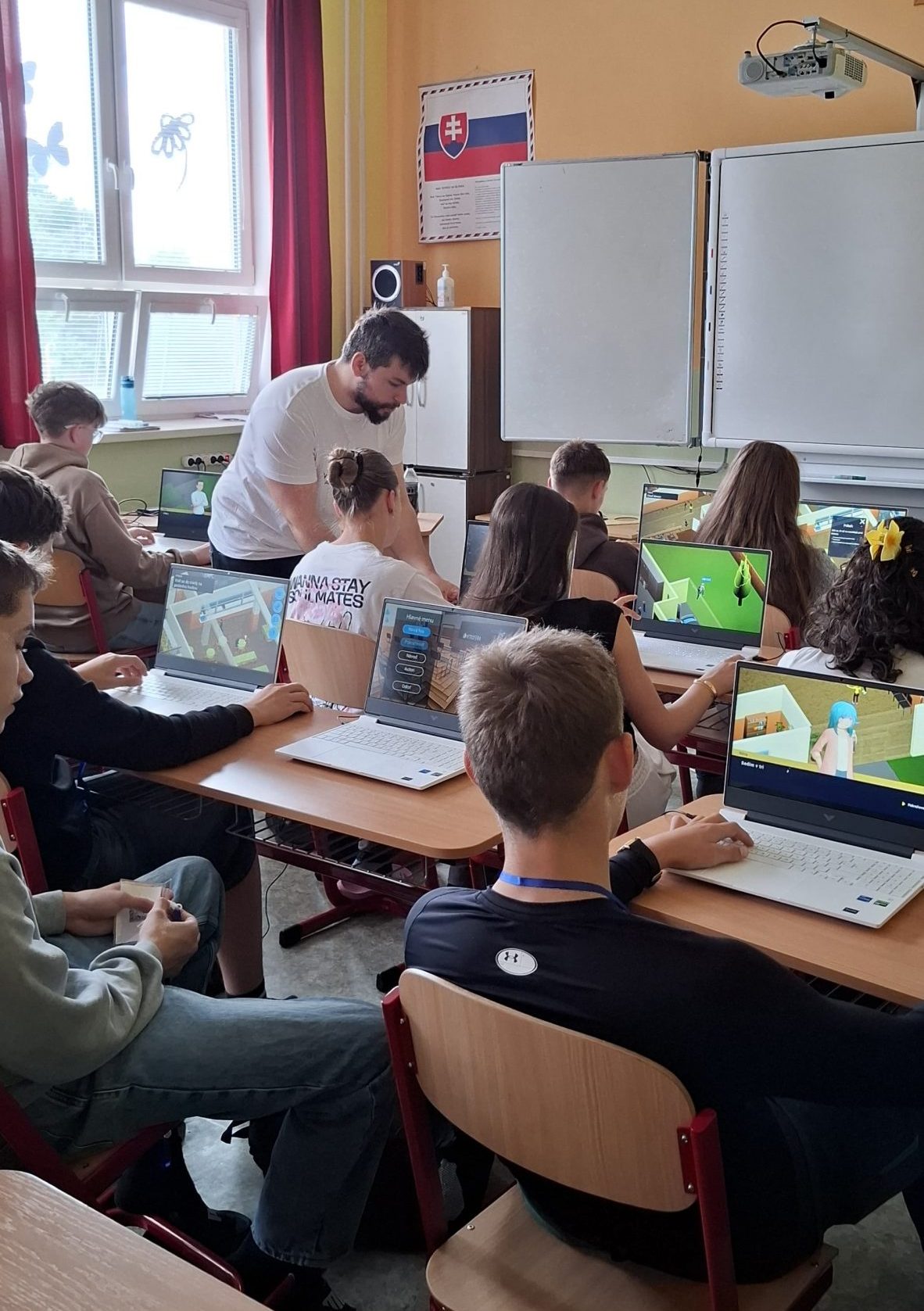 Žiaci v triede s učiteľom