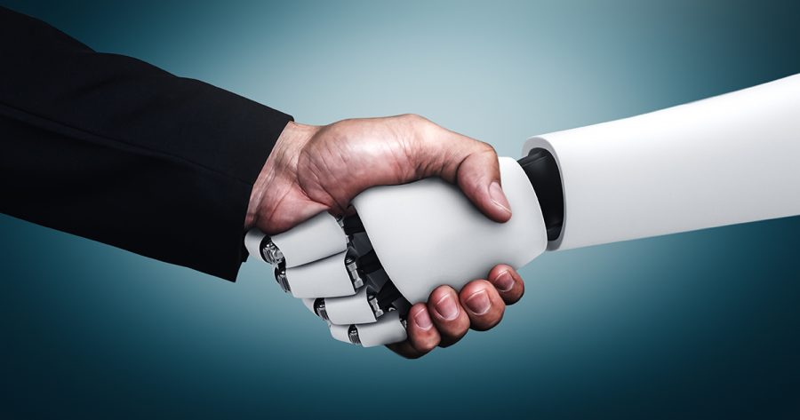Ilustračné foto: pozdrav rúk - ľudskej a robotickej. Zdroj: iStock