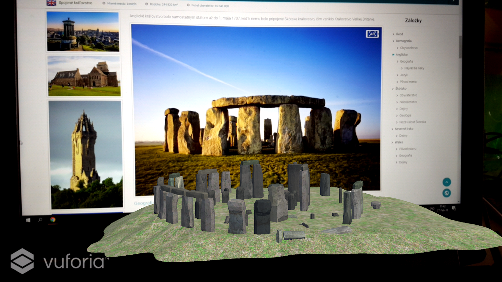 Mobilná aplikácia s obohatenou realitou zobrazujúca model Stonehenge na obrazovke telefónu